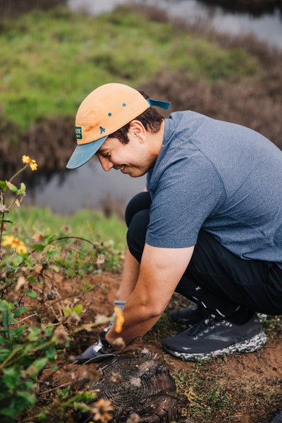 person working on a trail