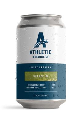 Athletic Brewing Company Pilot Program Wet Hop IPA non-alcoholic beer 12 oz can with a white and navy blue label, green Wet Hop IPA banner, and condensation droplets.