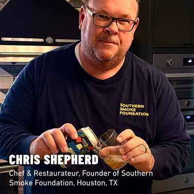 Chris Shepherd pouring a can of Aftershift non-alcoholic brew into a glass