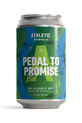12 fl oz can of Athletic Brewing Pedal to Promise non-alcoholic IPA. The can features a green and blue design with cycling illustrations, a large green Athletic “A,” and bold white “Pedal to Promise” lettering.