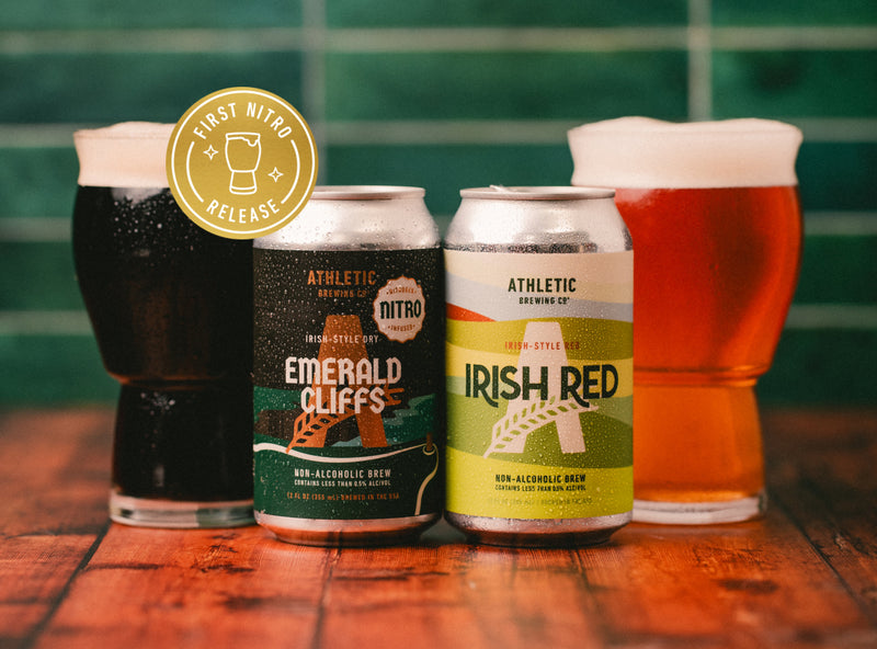 Nitro Emerald Cliffs and Irish Red cans on table next to glasses